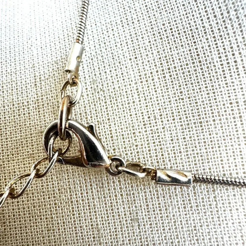Gold tone pendant necklace